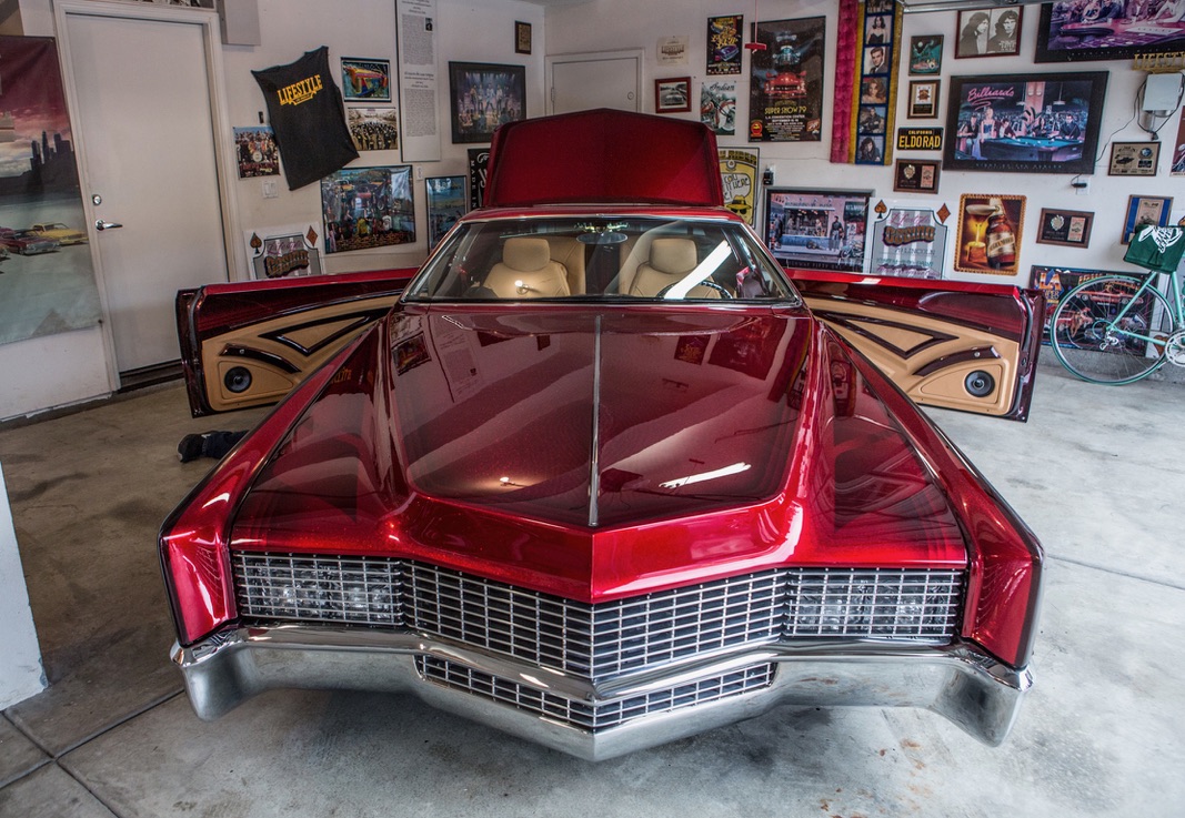 THE CANDY RED '67 ELDORADO, DOORS OPEN IN THE HOME GARAGE