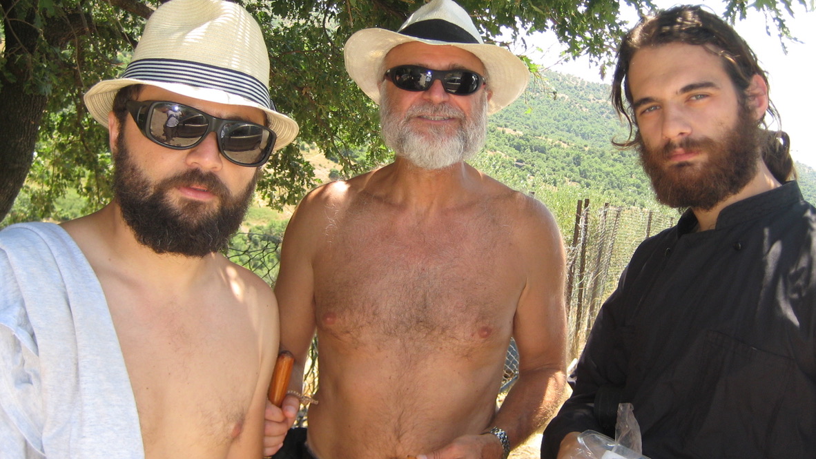 ON SET IN METEORA GREECE — WITH THE DIRECTOR AND CAST IN THE SHADE