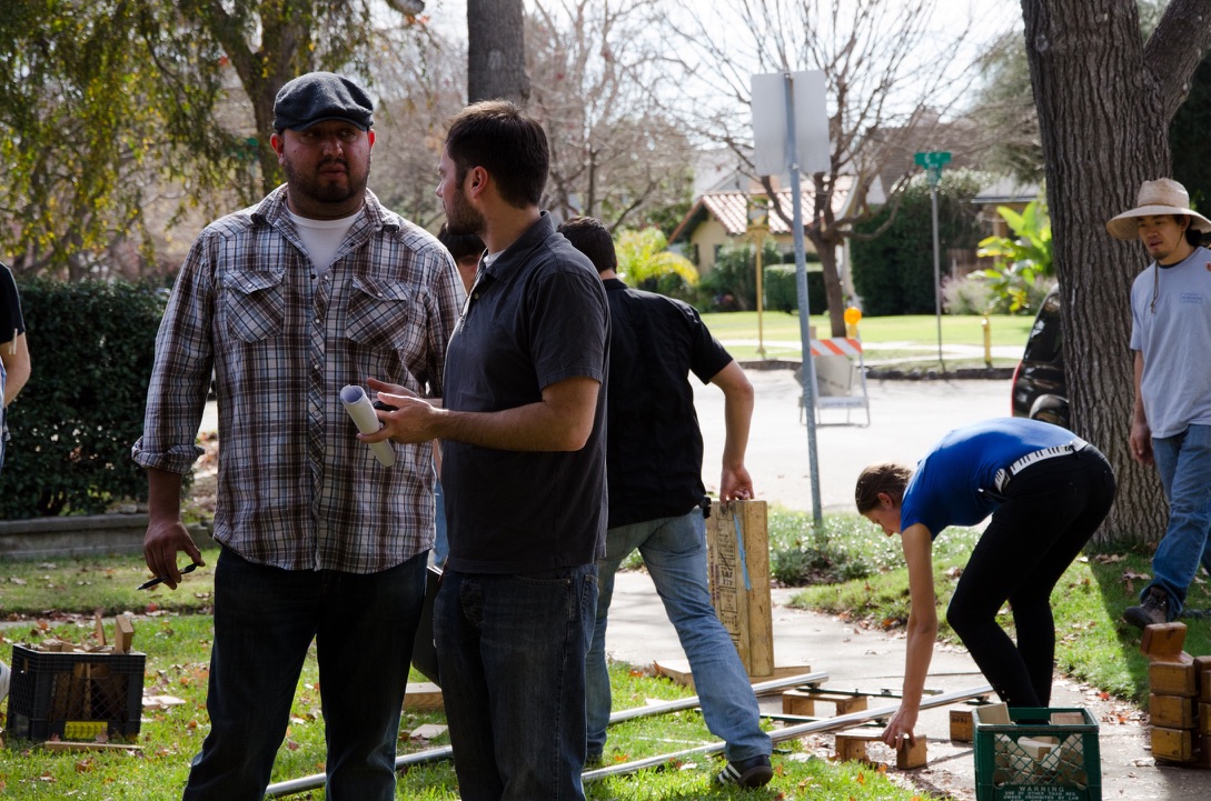 DAYTIME BLOCKING — GRIPS LAYING DOLLY TRACK