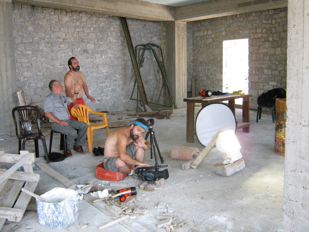 ON LOCATION IN GREECE — RESETTING BETWEEN TAKES IN THE STONE INTERIOR