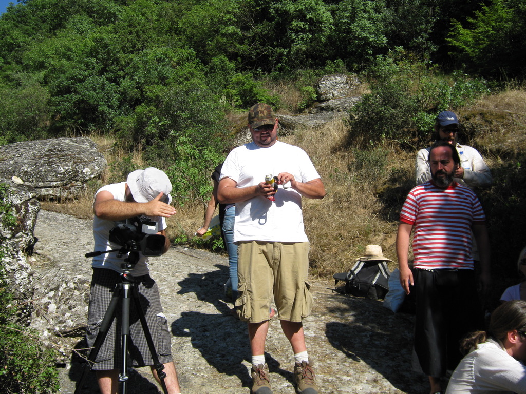 ON LOCATION IN GREECE — THE CREW REGROUPING ON THE ROCK TRAIL