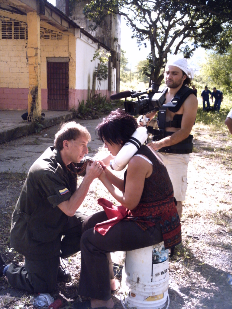 DIRECTOR SPIROS STATHOULOPOULOS PREPARES THE STEADICAM SETUP OUTSIDE THE ABANDONED SCHOOLHOUSE.