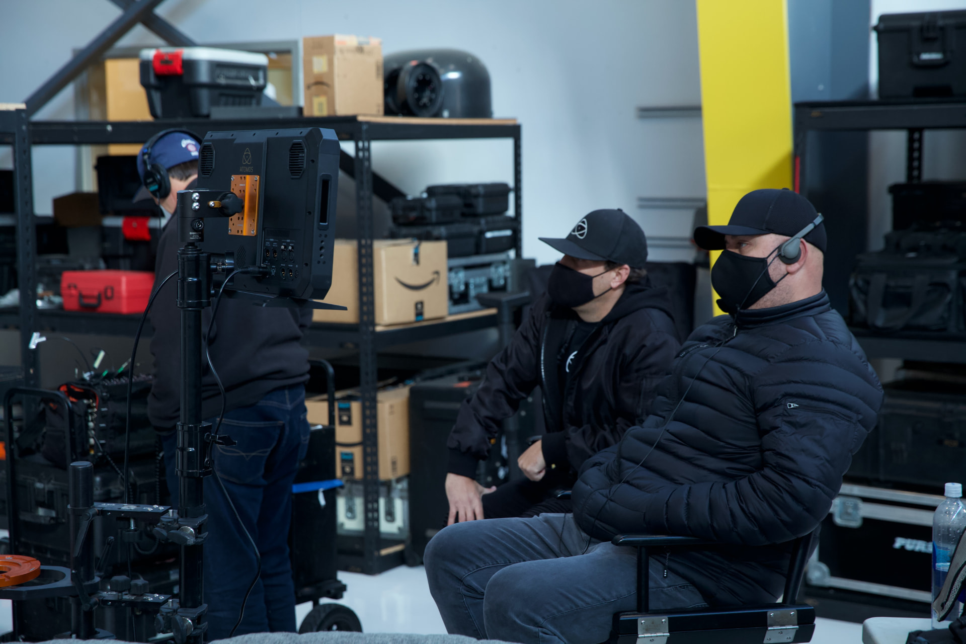 AT THE MONITOR WITH THE ATOMOS PRODUCTION TEAM