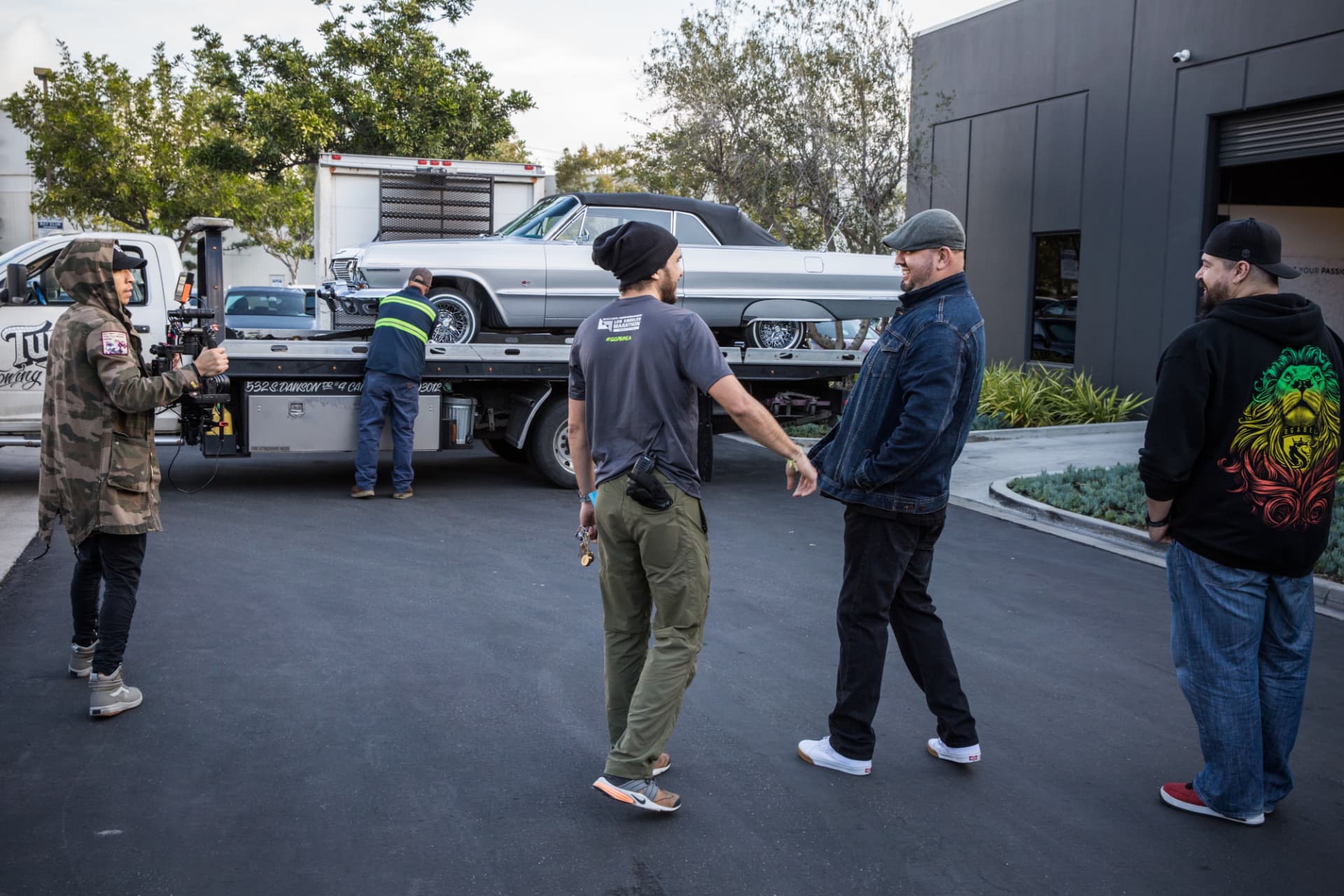 LOWRIDER ROLL MODELS — CAR ARRIVING ON THE FLATBED