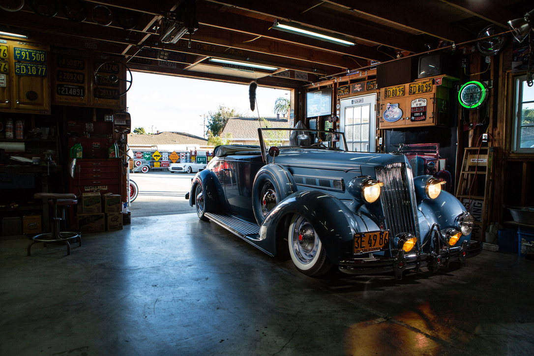 INSIDE THE GARAGE — '36 PACKARD UNDER THE SHOP LIGHTS